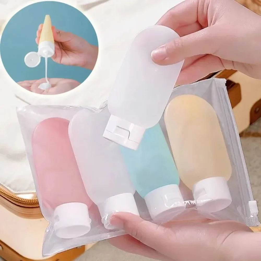 Set of small travel bottles with a clear pouch, one bottle being opened.