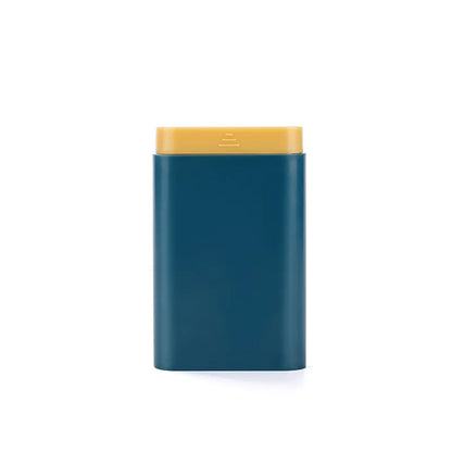 Blue rectangular container with a yellow lid on a white background