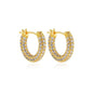 Gold hoop earrings with clear gemstones on a white background