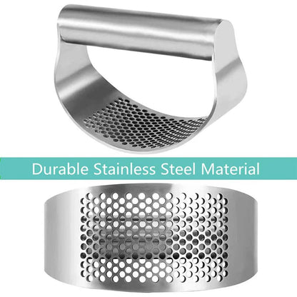 Metallic garlic press with perforated design on a white background
