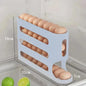 Egg holder with eggs inside, showing dimensions on a refrigerator door.