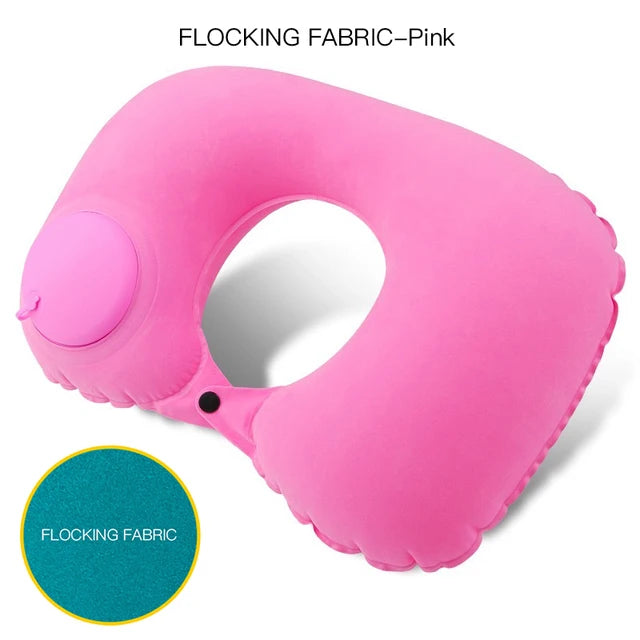 Pink inflatable neck pillow with flocking fabric on a white background
