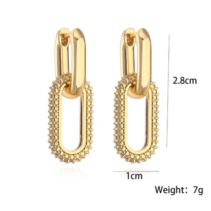 Gold hoop earrings with measurements and weight on a white background