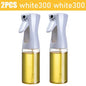 Two white spray bottles with yellow liquid on a white background
