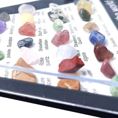 Collection of colorful stones on a tray with labels